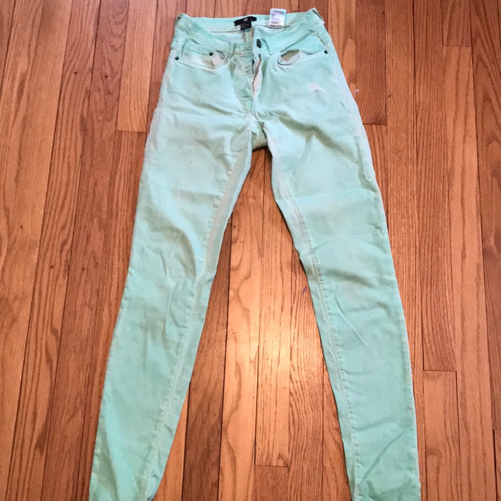 H&M’ turquoise pants, with faded look